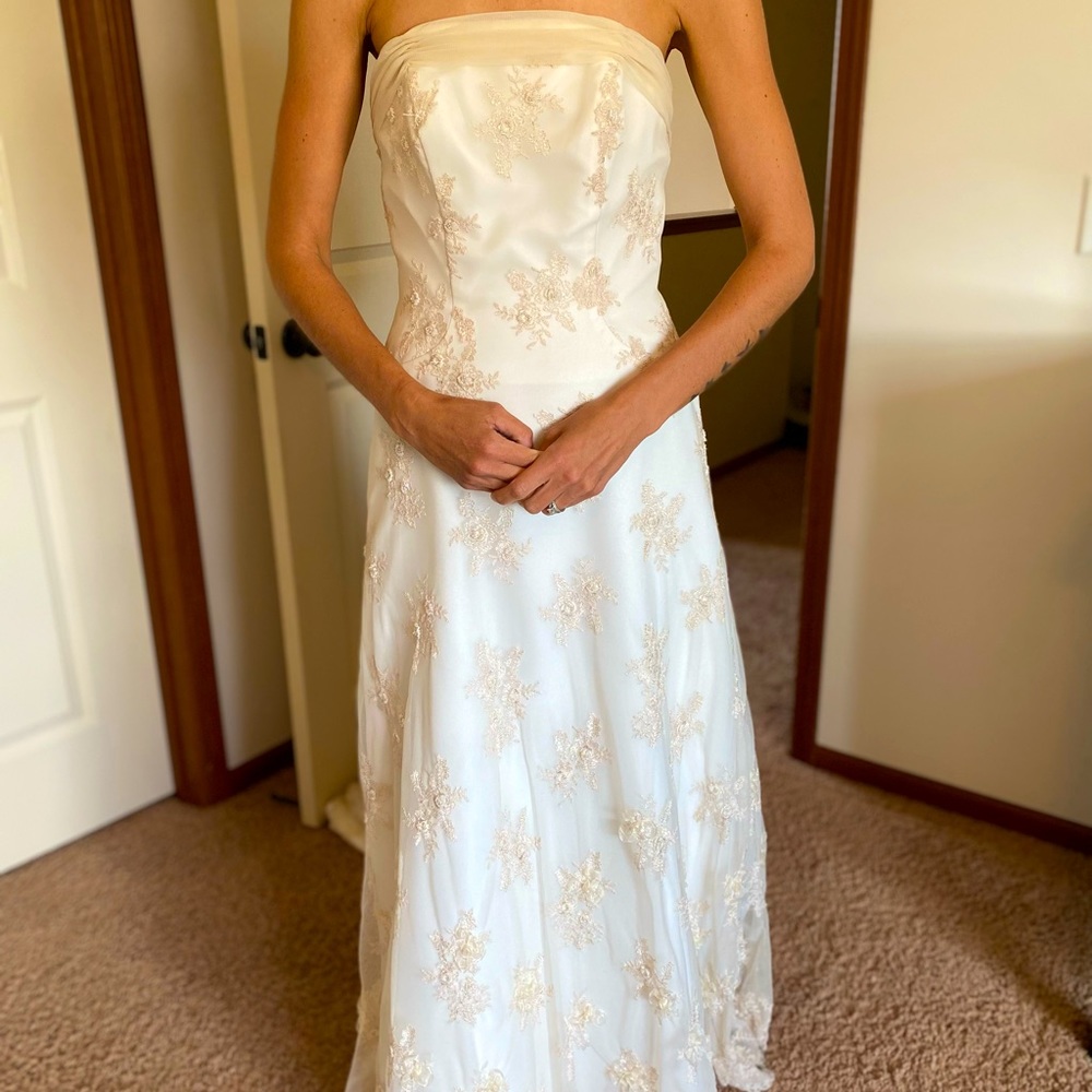 Monique Lou from David’s Bridal Ivory Wedding Gown